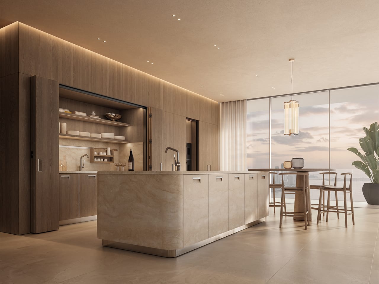 Arclinea Kora eiland in travertijn met ronde hoeken, Folia tafel en een wand in Tobacco Oak met open Modus-deuren.