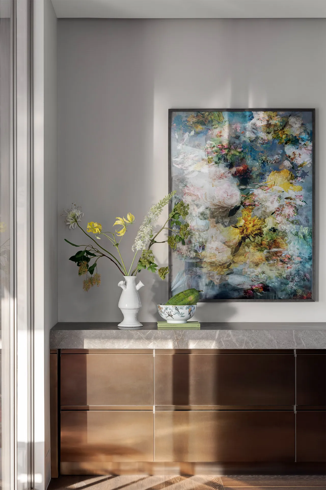 Arclinea Convivium detail PVD brons afwerking met natuursteen werkblad naadloze Italiaanse verwerking